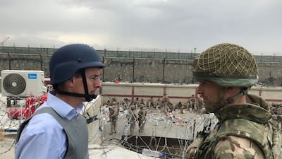 Laurie Bristow, left, Britain's ambassador to Afghanistan, during the UK evacuation effort in Kabul, Afghanistan. Reuters