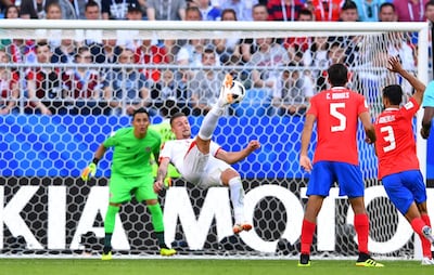 Serbia's Sergej Milinkovic-Savic attempts an overhead kick against Costa Rica. Dylan Martinez / Reuters