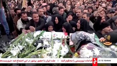 A screengrab of a video shows mourners at a funeral for people killed in public protests in Tehran. Reuters