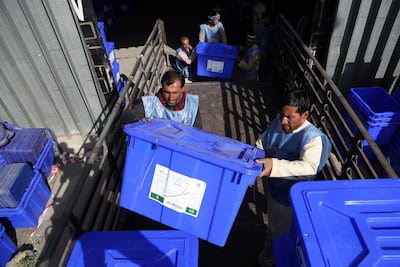 Afghan election workers load a lorry with ballot boxes and other materials for the presidential election on September 28, 2019. AP Photo