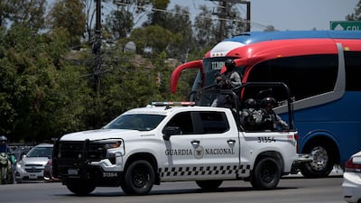 Members of Mexico's National Guard escorting the bus transporting Iran's national football team for a training session arrive at the Caliente Stadium in Tijuana, Mexico, on June 8, 2026, ahead of the 2026 World Cup football tournament. AFP