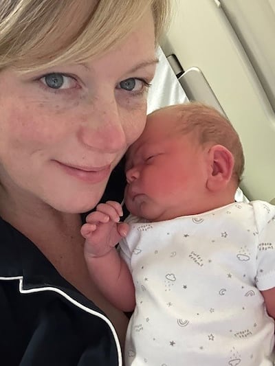 Stacey Broadmeadow with her miracle baby, Harry, who was born after two viable embryos were created following her life-saving cancer treatment. PA