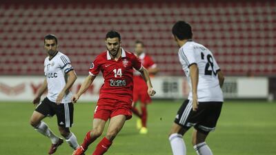 Oussama Assaidi in action for Al Ahli during an Asian Champions League game against Nasaf on March 18. Sarah Dea / The National