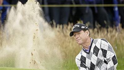 Tom Watson plays out of a bunker on the 14th hole on his way to a magnificent five-under 65 in the British Open.