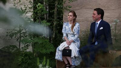 Princess Beatrice, elder daughter of Prince Andrew, Duke of York, and Edoardo Mapelli Mozzi, her husband, admire one of the gardens at the Chelsea Flower Show. Getty