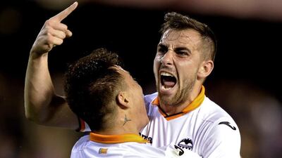 Paco Alcacer celebrates a goal for Valencia against FC Basel in a 2014 Europa League match. Jose Jordan / AFP
