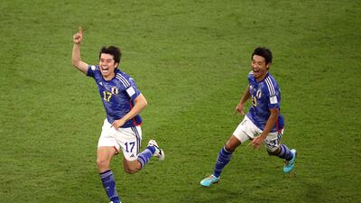 Ao Tanaka celebrates after scoring. Getty