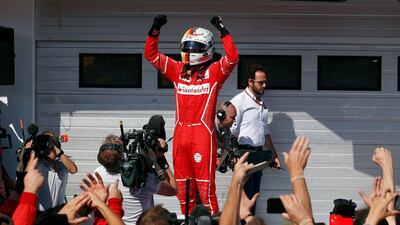 Sebastian Vettel celebrates after winning the Hungarian Formula One Grand Prix. Darko Bandic / AP Photo