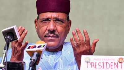 Niger's newly elected president Mohamed Bazoum gestures at his party headquarters after the announcement of his election in Niamey, on February 23. AFP