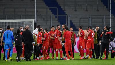 North Macedonia players celebrate after the match. EPA