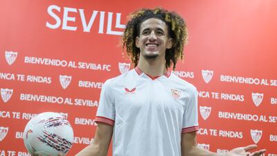 Sevilla's new player Hannibal Mejbri posesfor photos during his presentation as Sevilla FC's player in Seville, Spain, 17 January 2024. Mejbri arrives on loan from Manchester United until the end of the season. EPA / Raul Caro
