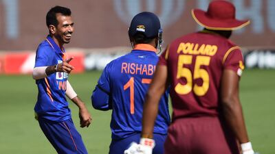 India's Yuzvendra Chahal celebrates the dismissal of West Indies' captain Kieron Pollard during the first ODI at the Narendra Modi Stadium in Ahmedabad on Sunday, February 6, 2022. AFP