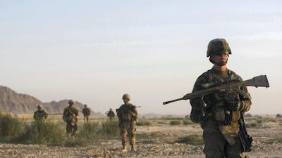 US Army soldiers patrol in the village of Chariagen in the Panjwai district of Kandahar province southern Afghanistan in 2011. Reuters