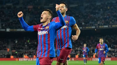 Barcelona's Spanish midfielder Ferran Jutgla (L) celebrates scoring his team's opening. AFP