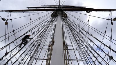 A climber scales the rigging of the Cutty Sark on Thursday in Greenwich, south London, at a preview of the Cutty Sark Rig Climb Experience, which opens to the public from Saturday. For the first time since the ship arrived in Greenwich in 1954, visitors will be able to climb the masts and enjoy views of the Thames and London. PA