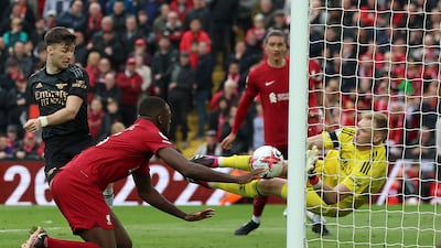 PREMIER LEAGUE TEAM OF THE WEEK: GK: Aaron Ramsdale (Arsenal). Delivered a big-game performance when his team needed him most as the England goalkeeper produced three sensational saves, including two at the death, to earn Arsenal a point at Liverpool in a game-of-the-season contender. Reuters