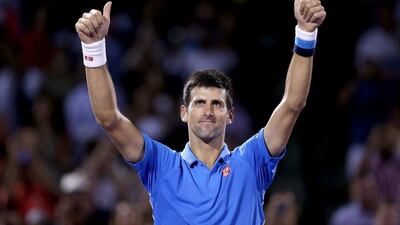 Novak Djokovic salutes the crowd after defeating John Isner in the Miami Open semi-final on Friday, April 3. Matthew Stockman / Getty
