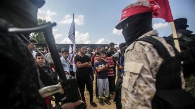 Fighters of Popular Front of the Liberation of Palestine (PFLP) attend the funeral of Naji Al-Zaaneen in Beit Hanun town in the northern Gaza Strip. EPA