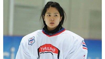 Wasunun Angkulpattanasuk, left, the Thailand goalkeeper, took up the position after watching her brother play.