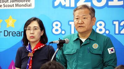 South Korean Interior Minister Lee Sang-min, right, gives a press briefing on the relocation of about 36,000 Scouts ahead of the arrival of Typhoon Khanun. EPA
