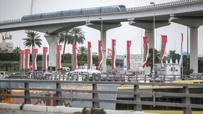 Dubai, United Arab Emirates- Omani flags on display at Sheikh Zayed Road roundabout. Leslie Pableo for The National