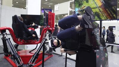 Participants try out virtual reality devices during the Next ICT Convergence Expo in Seoul, South Korea. The advent of 5G will bring about massive change in the devices we use and what they look like and can do. EPA