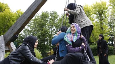 Yasmin, 16, pushes Hana, 16, on a swing after finishing a GCSE exam near their school in Hackney, east London. Hana started wearing her headscarf full time aged 12. She was already wearing it at school and her family supported her so it was easy for her to make the decision. She says if felt like nothing had changed except her relationship with God. All photos Olivia Harris / Reuters