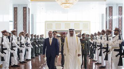 Sheikh Mohammed bin Zayed, Crown Prince of Abu Dhabi and Deputy Supreme Commander of the Armed Forces, greets Egyptian president Abdel Fattah El Sisi with an honour guard at the Presidential Airport on Tuesday. Ryan Carter / Crown Prince Court – Abu Dhabi