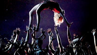 Madonna performs Living for Love onstage during the Grammy Awards. Kevork Djansezian / Getty Images / AFP