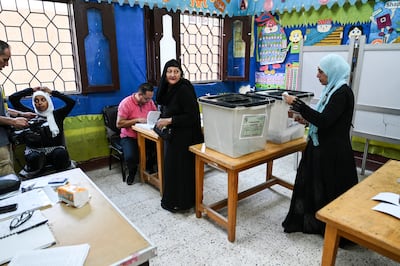 Some Egyptians have claimed to have exchanged votes for cash payments or packages of food. EPA