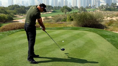 DUBAI, UNITED ARAB EMIRATES - JANUARY 29: Gregory Havret of France tees off on the eighth hole during the first round of the Dubai Desert Classic on the Majilis course at Emirates Golf Club on January 29, 2009 in Dubai, United Arab Emirates. (Photo by Andrew Redington/Getty Images) *** Local Caption *** GYI0056605249.jpg