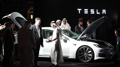 US electric car maker Tesla opened for business in Dubai on Monday. Karim Sahib / AFP Photo