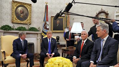 United States Special Presidential Envoy for Hostage Affairs Robert O'Brien is seen here on the right while President Donald Trump speaks to former hostage Danny Burch at the White House in March after his release in Yemen. AP Photo