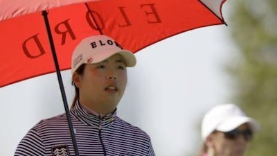 Shanshan Feng likes to give herself some pep talk during competition. Kamran Jebreili / AP Photo