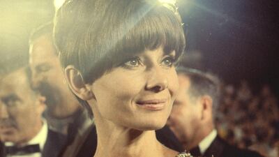 1975: Audrey Hepburn pictured in a beaded gold Givenchy gown at the 1975 Oscars. Getty Images