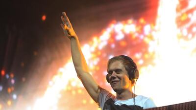 Playing the trust game with Armin van Buuren. The Dutch trance king’s du Arena show on Friday was defined by its deafening volume and dazzling visuals. However, it was a rare moment of calm that stood out – the moment we all sat down. In what felt like a collective trust exercise, superstar DJ Armin van Buuren instructed his five-figure crowd to let their inhibitions go and sit on the ground – before ramping the beats back up for the most euphoric trance-out of the night. The moment was part of an impressive, arm-waving choreographed breakdown to the track Ping Pong, and came shortly before a communal singalong to a remix of John Lennon’s Imagine. Most remarkable, perhaps, is that van Buuren topped his incredible two-and-a-half-hour set with an equally epic performance next door at O1ne Yas Island moments after leaving the stage. That’s what you call stamina. Delores Johnson / The National