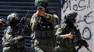 Israeli forces take part in a raid in Qalandiya refugee camp, in the Israeli-occupied West Bank, August 5, 2026. Reuters
