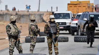 Nigerien soldiers stand guard outside the Diffa airport in South-East Niger on December 23. AFP
