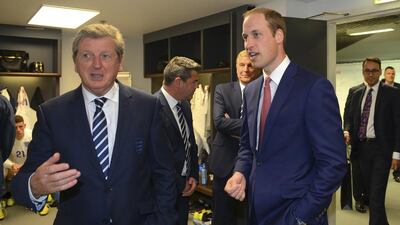 Prince William shown with Roy Hodgson following England's international friendly on Friday. Michael Regan / Reuters / May 30, 2014