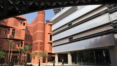 Masdar scaled back the cost estimate for Masdar City, its carbon-neutral flagship development.