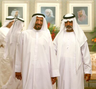 Sheikh Nahyan bin Mubarak Al Nahyan, right, with his father, Sheikh Mubarak, in Abu Dhabi in 2008. The National