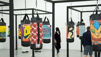Fisticuffs features punchbags that were used as canvases by 32 artists. Courtesy of FN Designs