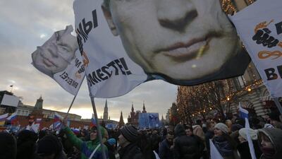 People in Moscow express support for Russia’s annexation of Crimea. A reader says by doing so, Vladimir Putin has shouldered additional responsibilities that are likely to complicate matters in the future. Maxim Shemetov / Reuters