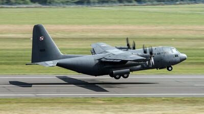 A Lockheed C-130 Hercules takes off for a test flight. The firm has won a major US defence contract Tomasz Koryszko / EPA