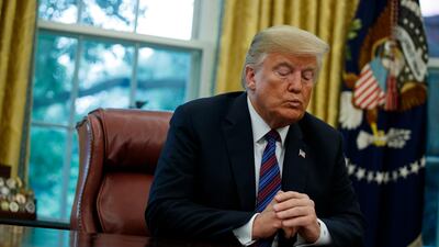 President Donald Trump's stance on tariffs could spark a global trade war. AP