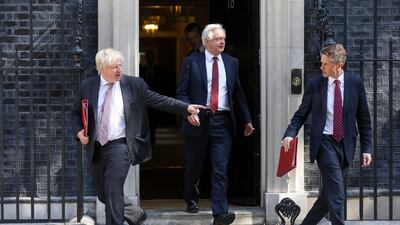 On July 3, 2018, Boris Johnson, British foreign secretary, left, David Davis, Brexit secretary, centre, and Gavin Williamson, UK defence secretary, leave a Cabinet meeting at 10 Downing Street. Chris Ratcliffe / Bloomberg
