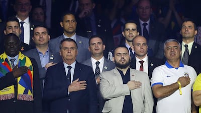 Brazilian President Jair Bolsonaro, second left, attends the Copa America 2019 Group A match against Bolivia at Morumbi Stadium in Sao Paulo, Brazil. EPA