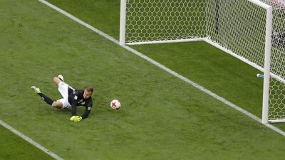 Germany goalkeeper Bernd Leno fails to make a save as Australia's Tomas Rogic scores his side's first goal during the Confederations Cup, Group B soccer match between Australia and Germany. AP Photo