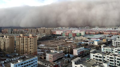 A sandstorm hits the city of Zhangye in Gansu province, China. Reuters