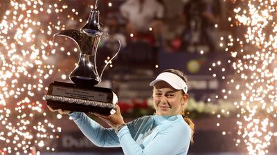 Jelena Ostapenko with the trophy after winning the Dubai Duty Free Tennis Championships. AFP